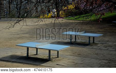 Plastic Tables And Table Tennis In The Park With A Threshing Floor And Benches. The Tables Are Wind 