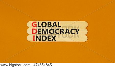 Gdi Global Democracy Index Symbol. Concept Words Gdi Global Democracy Index On Wooden Stick On A Bea