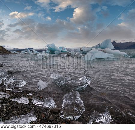 Jokulsarlon Glacial Lake, Lagoon With Ice Blocks, Iceland. Situated Near The Edge Of The Atlantic Oc