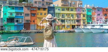 Woman Traveler Visiting In Taiwan, Tourist With Backpack And Hat Sightseeing In Keelung, Colorful Zh