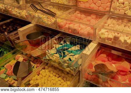 Colorful Candies In Jars. Large Choice Of Sweets In Candy Shop. Chewy Marmalade And Small Caramels. 