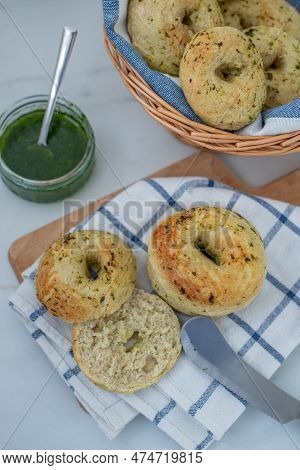 Home Made Whole Grain Bagels With Wild Garic On A Table