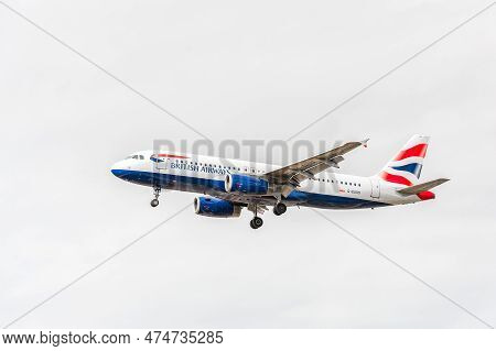 London, England - August 22, 2016: G-euus British Airways Airbus A320 Landing In London Heathrow Int