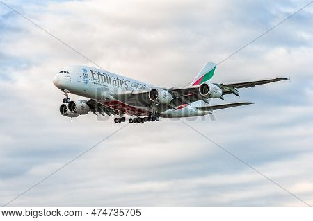 London, England - August 22, 2016: A6-een Emirates Airlines Airbus A380 Landing In London Heathrow I