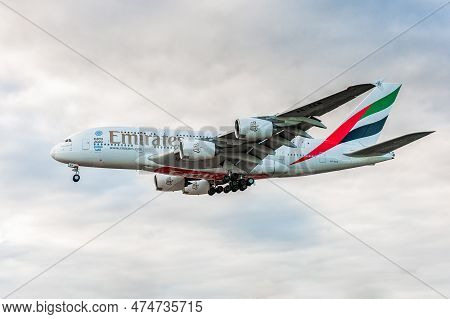 London, England - August 22, 2016: A6-een Emirates Airlines Airbus A380 Landing In London Heathrow I