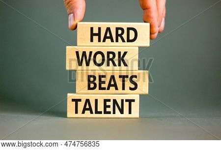 Hard Work Beats Talent Symbol. Concept Words Hard Work Beats Talent On Woodenblock. Beautiful Grey T