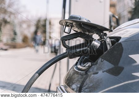 Charging Station For Electric Cars. Types And Connectors Of Ports For Charging Vehicles.