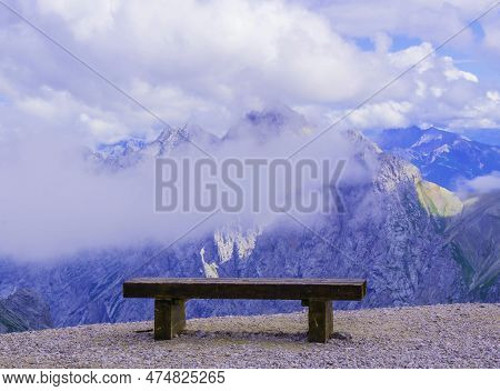 Wooden Bench On Viewpoint Of Mountain Zugspitze Bavaria