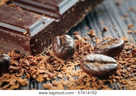 Fresh Roasted Coffee Beans And Stack Of Brown Chocolate