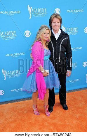 John Fogerty and Wife Julie  at the 45th Academy of Country Music Awards Arrivals, MGM Grand Garden Arena, Las Vegas, NV. 04-18-10