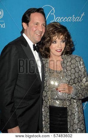 Joan Collins and husband Percy Gibson  at the 2009 UNICEF Ball Honoring Jerry Weintraub, Beverly Wilshire Hotel, Beverly Hills, CA. 12-10-09