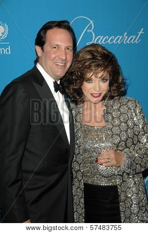 Joan Collins and husband Percy Gibson  at the 2009 UNICEF Ball Honoring Jerry Weintraub, Beverly Wilshire Hotel, Beverly Hills, CA. 12-10-09