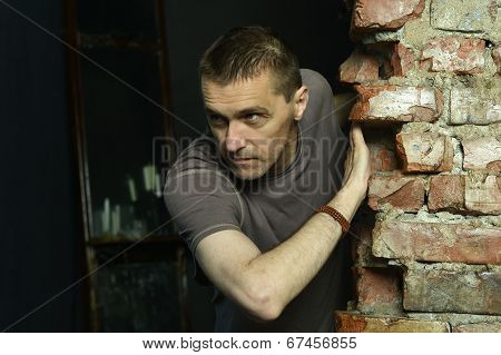 young man hiding