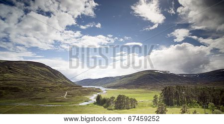 Loch And Mountain Landscape In The Cairngorm National Park, Scotland