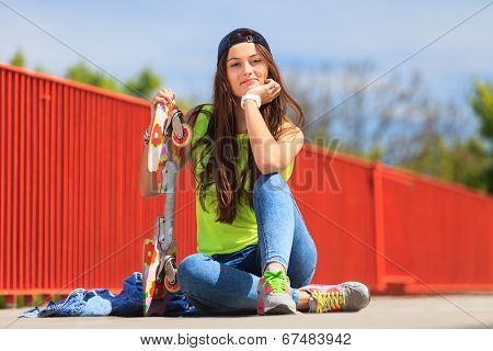 Summer Sport. Cool Girl Skater With Skateboard