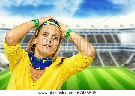 Brazilian fan desperate in a statium background