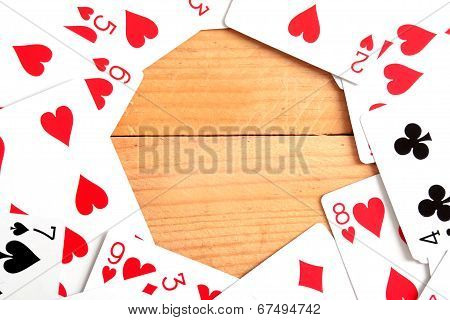 Many poker cards on a wood table