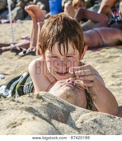 Boy Puts A White Blossom On A Girls Nose