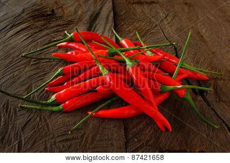 Bird eye red Chilis on vintage wooden background