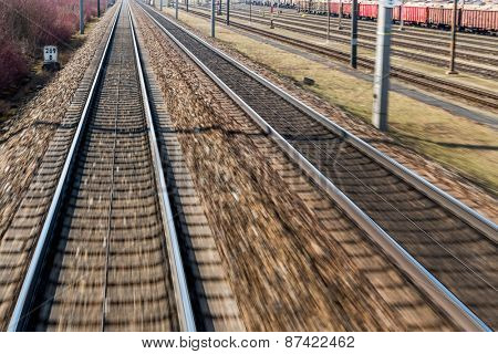 austria, upper austria, linz, wels. seen rails of a railway from a moving train between linz and wels from