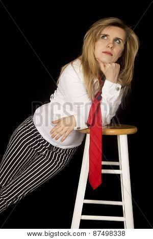 Female Model Leaning On A Barstool Looking Up