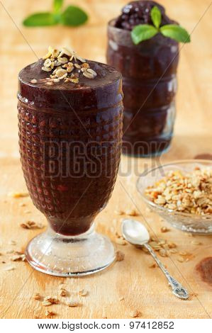 Acai Frozen Pulp Juice In Glass With Muesli