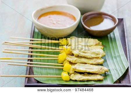 Grilled Pork Satay With Peanut Sauce And Vinegar, Thai Food.