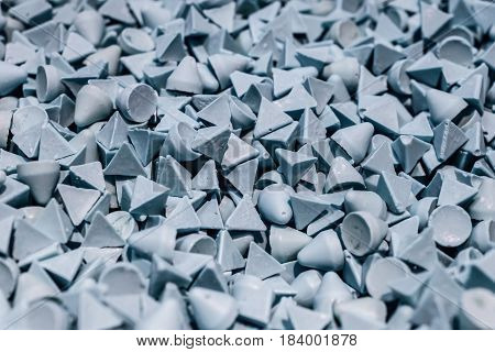 Abrasive stones for vibration grinding. Material for finishing metal products.