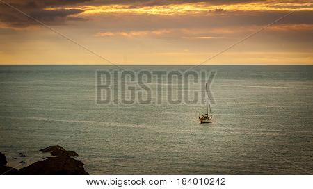 wooden boat in open water in Minehead Somerset UK.