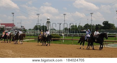 Churchill Downs, horses and riders being led to the starting gate, May 27th, 2016