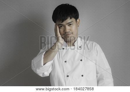 Chef portrait Asian young chef crossing arms.