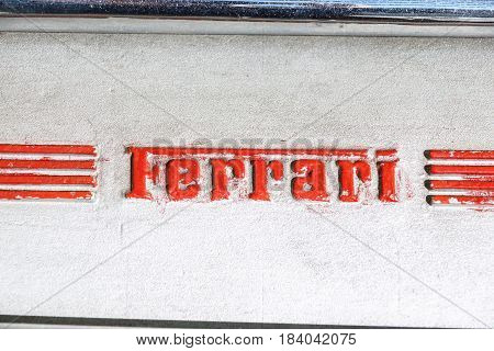 MODENA, ITALY - JULY 09: Logo Ferrari on motor of sport carat Exhibition of Ferrari cars on July 09, 2008 in Modena, Italy.