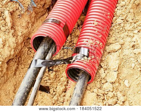 Wire In Hdpe And Protectivep Tube. Building Of Lines Of Metallic And Fiber Optic Cables,