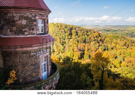 View from one of the windows at a castle just outside of Walbrzych Poland. Autumn day with clear blue skies and puffy white clouds
