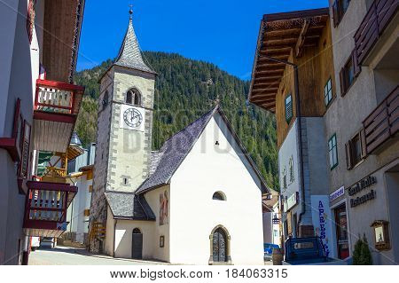 Canazei Italy - April 26 2012: The St Florian church in the old village