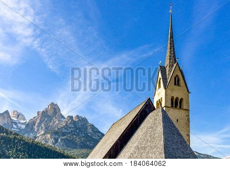 Italy Dolomites Pozza di Fassa the parish church bell tower