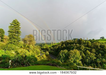 Double rainbow at Waitomo , North Island of  New Zealand