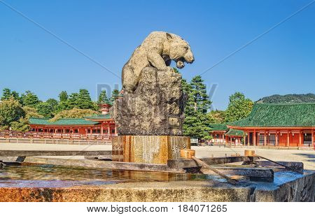 Stone Statue Of White Tiger Over Water Basin At Heian Shrine Heian Jingu In Kyoto, Japan