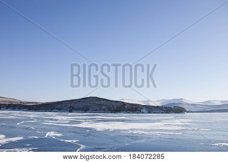 Ice of Lake Baikal near Ogoi island. Winter landscape