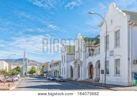ROBERTSON SOUTH AFRICA - MARCH 26 2017: A street scene with the municipal offices and Dutch Reformed Church in Robertson a town on the scenic Route 62 in the Western Cape Province