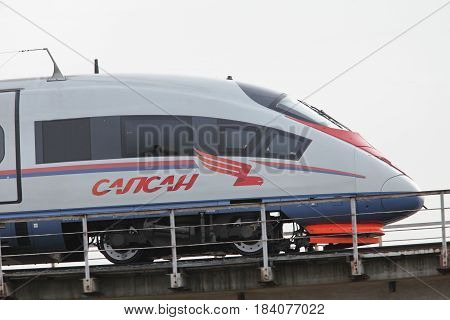 April 28 2017 St. Petersburg Russian Railways high-speed passenger train Sapsan from St. Petersburg to Moscow in motion low angle
