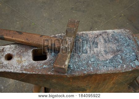 Tools of the blacksmith are an anvil and a hammer