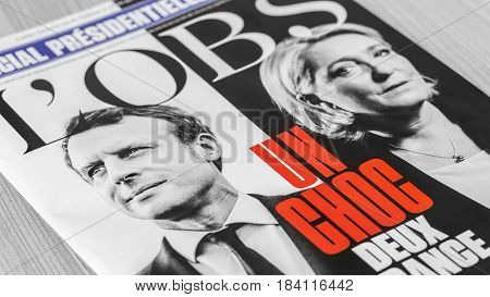 France - April 292017: Covers of the French magazine L'OBS featuring the two presidential candidates which won the first round of the French elections 2017. The main focus is on Macron's picture.