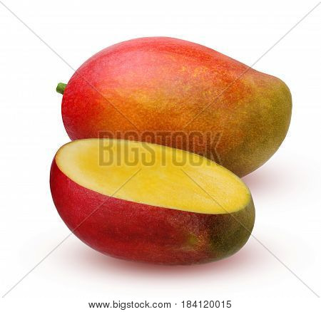 Isolated mango. Ripe mango is a fruit whole and half isolated on white background with shadows.