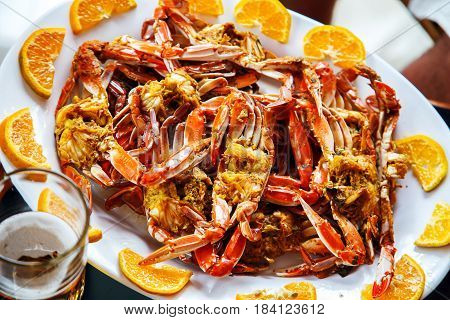 Delicious cooked crabs on a plate. Asian cuisine.