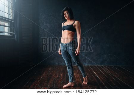 Contemp style dancer poses in dance class