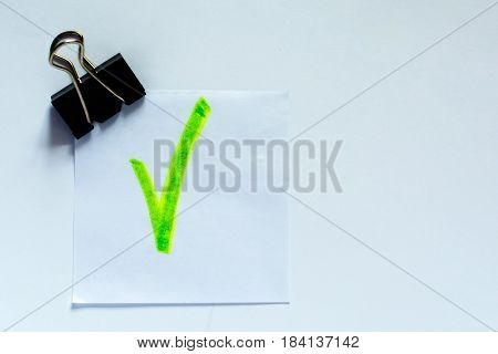 Grenn mark on white paper. Colored Leaflets for Recording. Whith black binder.