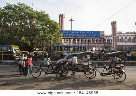 DELHI INDIA-JUN 10 : rickshaw and traffic in front of old delhi railway station of delhi on june 10 2015 india. rickshaw is three wheeler bike taxi in any local area of delhi