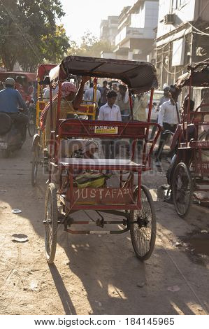 DELHI INDIA - MAR 23 : rickshaw in jam traffic at chandni chowk in old Delhi of Delhi on march 23 2015 india. rickshaw is three wheeler taxi for local area of Delhi
