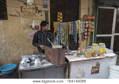 DELHI INDIA - DEC 20 : tradition india tea stall in at chawri bazar in old delhi of Delhi on december 20 2014 india. india tea or chai is popular drink in india